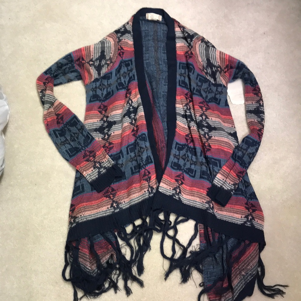 Open sweater with fringe